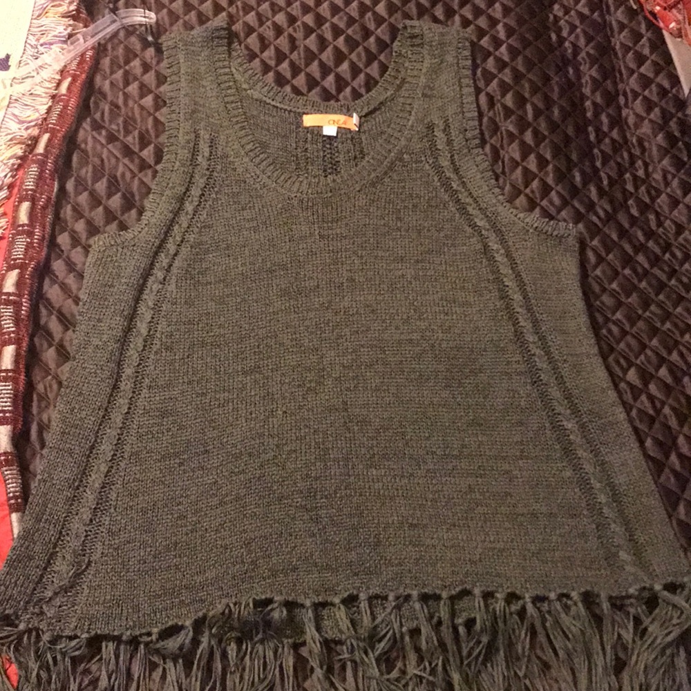 Cute sweater top with fringe on the bottom